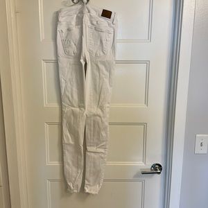 White American eagle holey skinny jeans